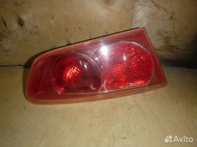 Фонарь задний внутренний левый mitsubishi lancer