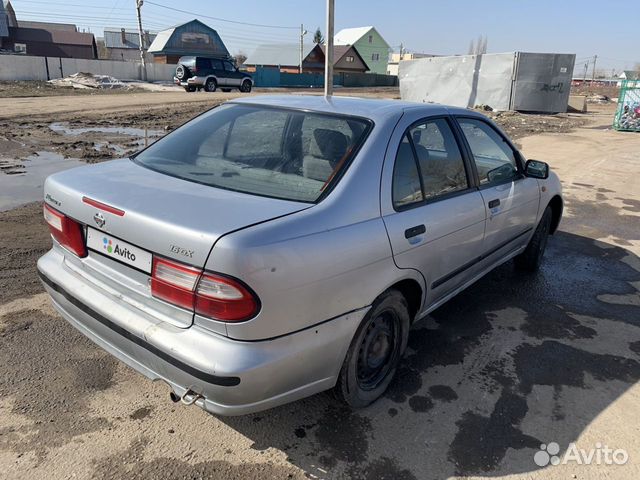 Nissan Almera 1.6 AT, 1998, 262 698 км