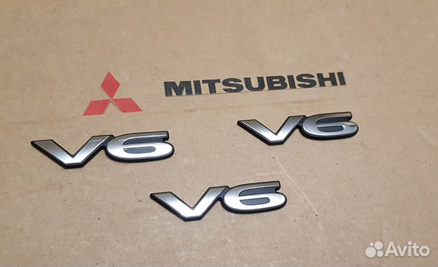 MB814468 Mitsubishi V6 эмблема mb814468 MB814468 Mitsubishi V6 эмблема mb814468
