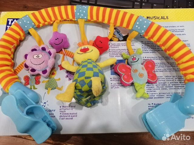 Дуга для коляски Развивающая Taf Toys музыкальная Дуга для коляски Развивающая Taf Toys музыкальная