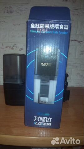 Аквариумная автоматическа кормушка