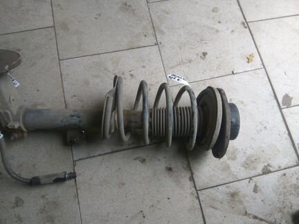 Амортизатор стойка передний левый Пежо 206