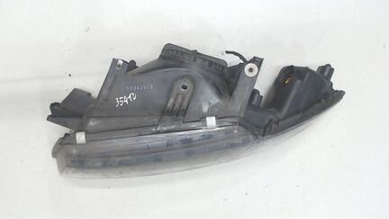 Фара (передняя) левая Mitsubishi Carisma, 2003