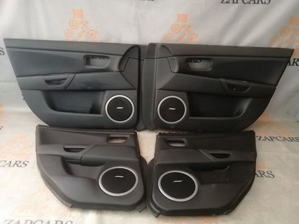 Обшивки дверей Mazda 3 BK LF17 2008