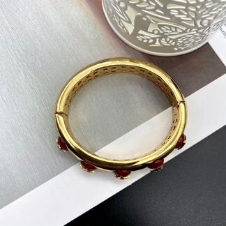 Браслет Louis Vuitton с бордовыми камнями