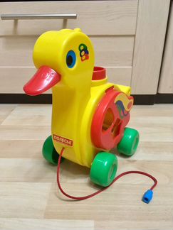 Развивающая игрушка Каталка сортер Уточка-несушка