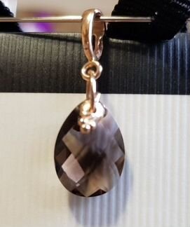 Золотой кулон с раухтопазом